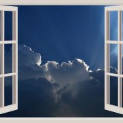 Looking at a dramatic sky through open window frames